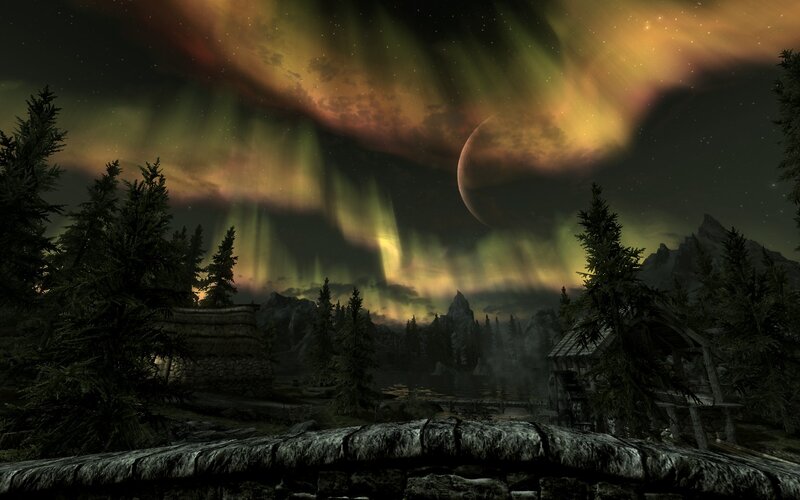 Aurora over a forest village