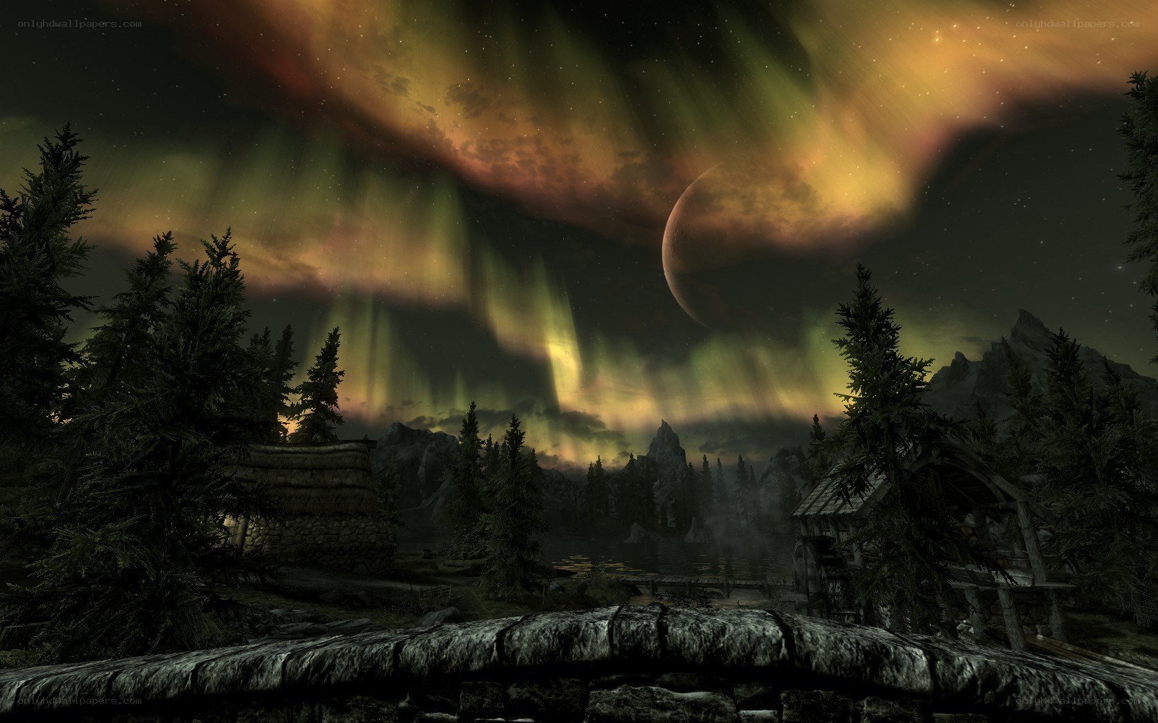 Aurora over a forest village