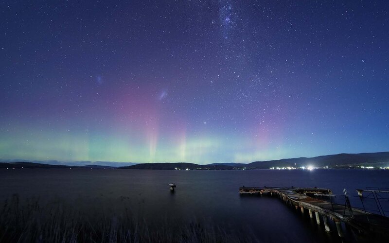 Aurora over a lake at night