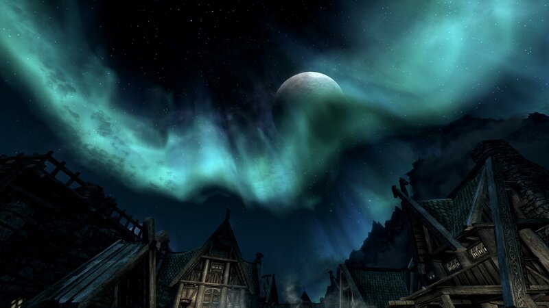 Aurora over a medieval village