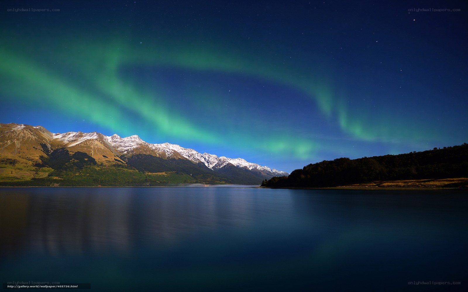 Aurora over a mountain lake