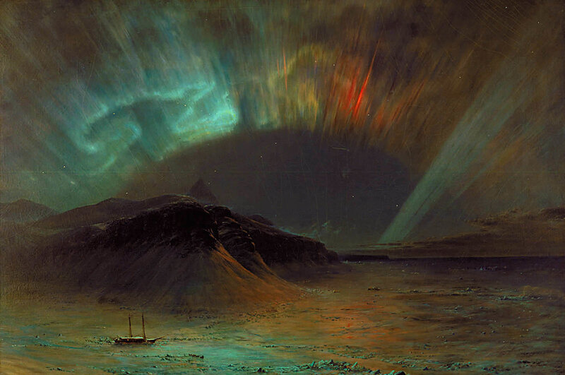 Aurora over a rocky shore