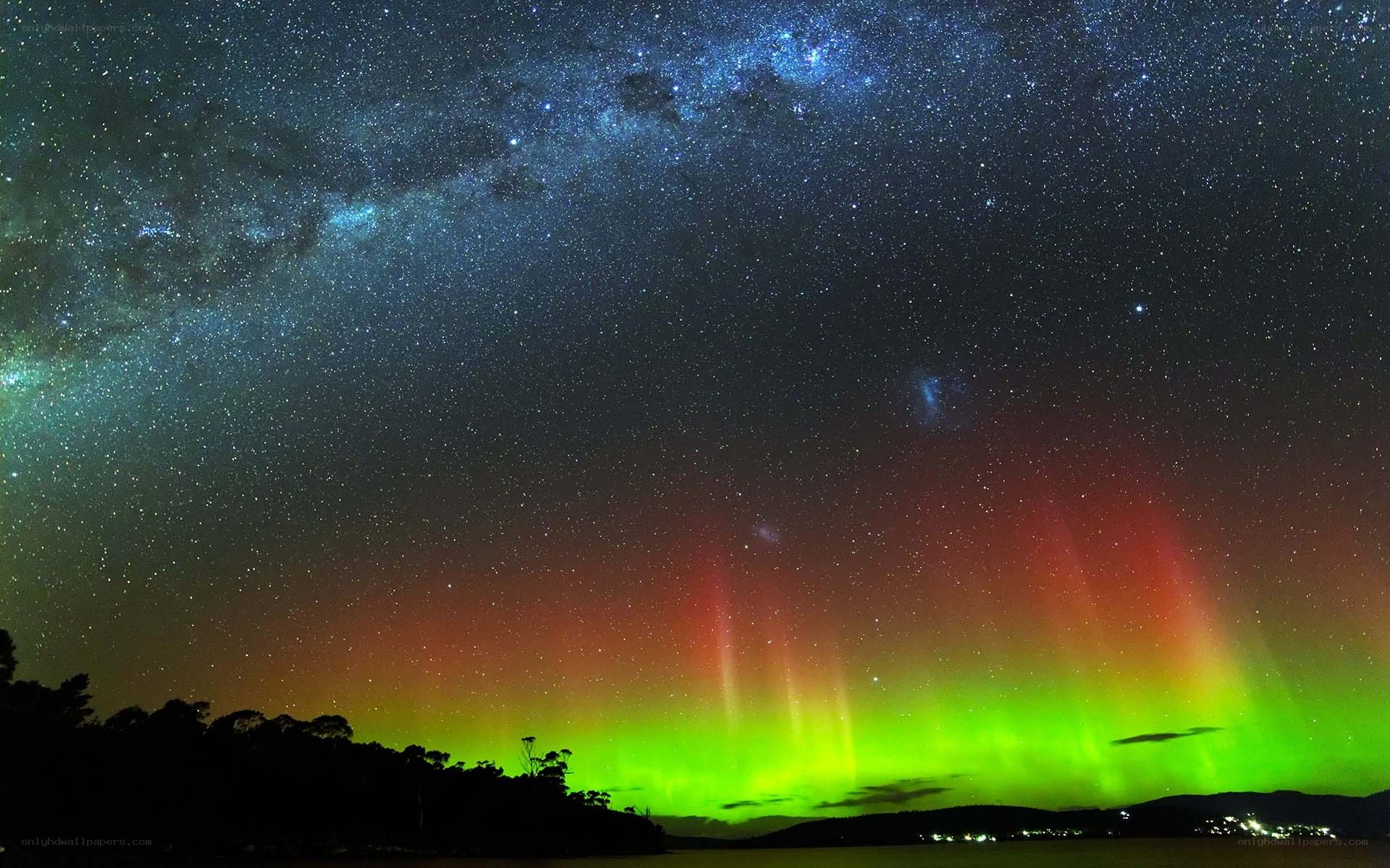 Aurora over a starry night