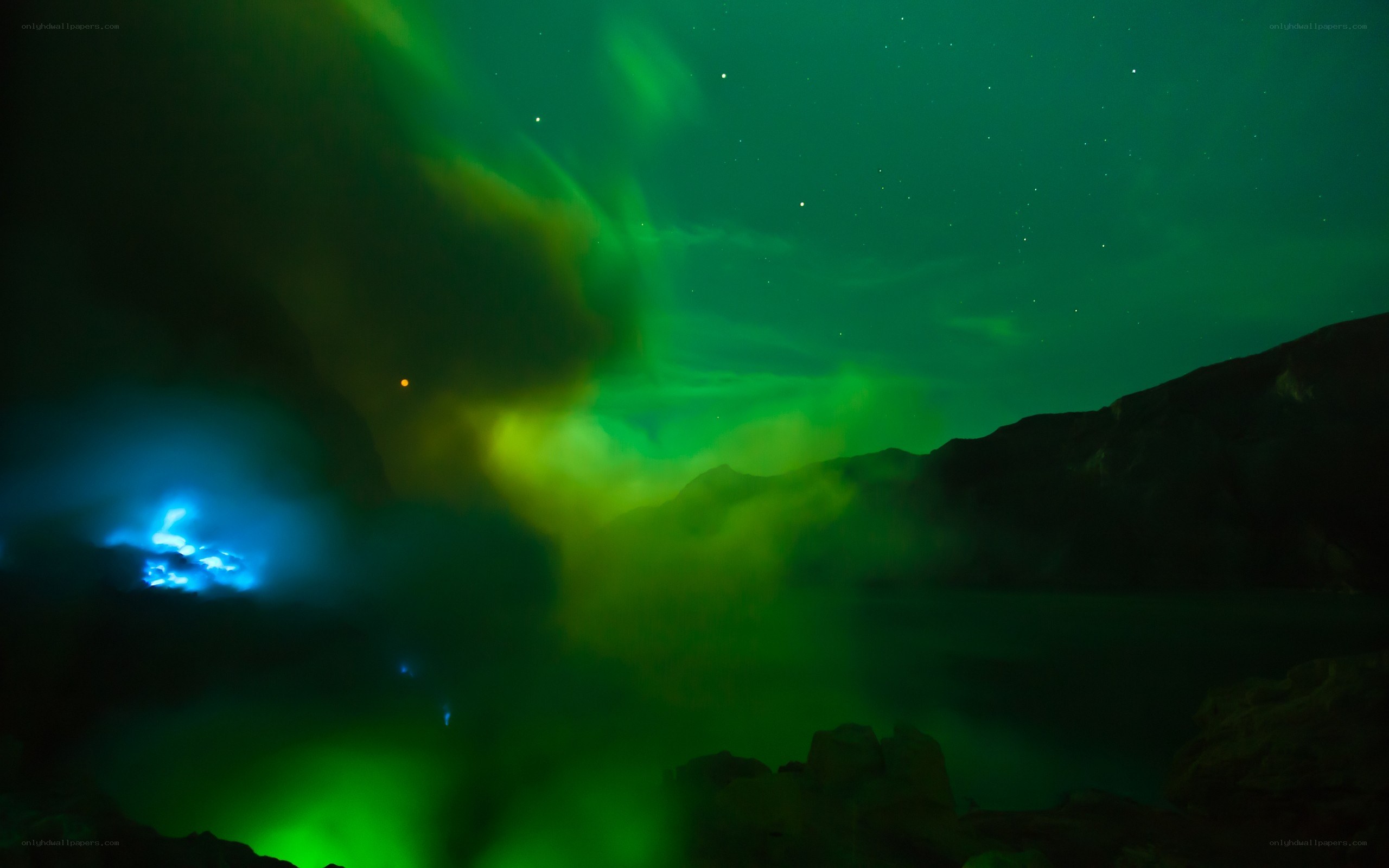 Aurora over a volcanic landscape