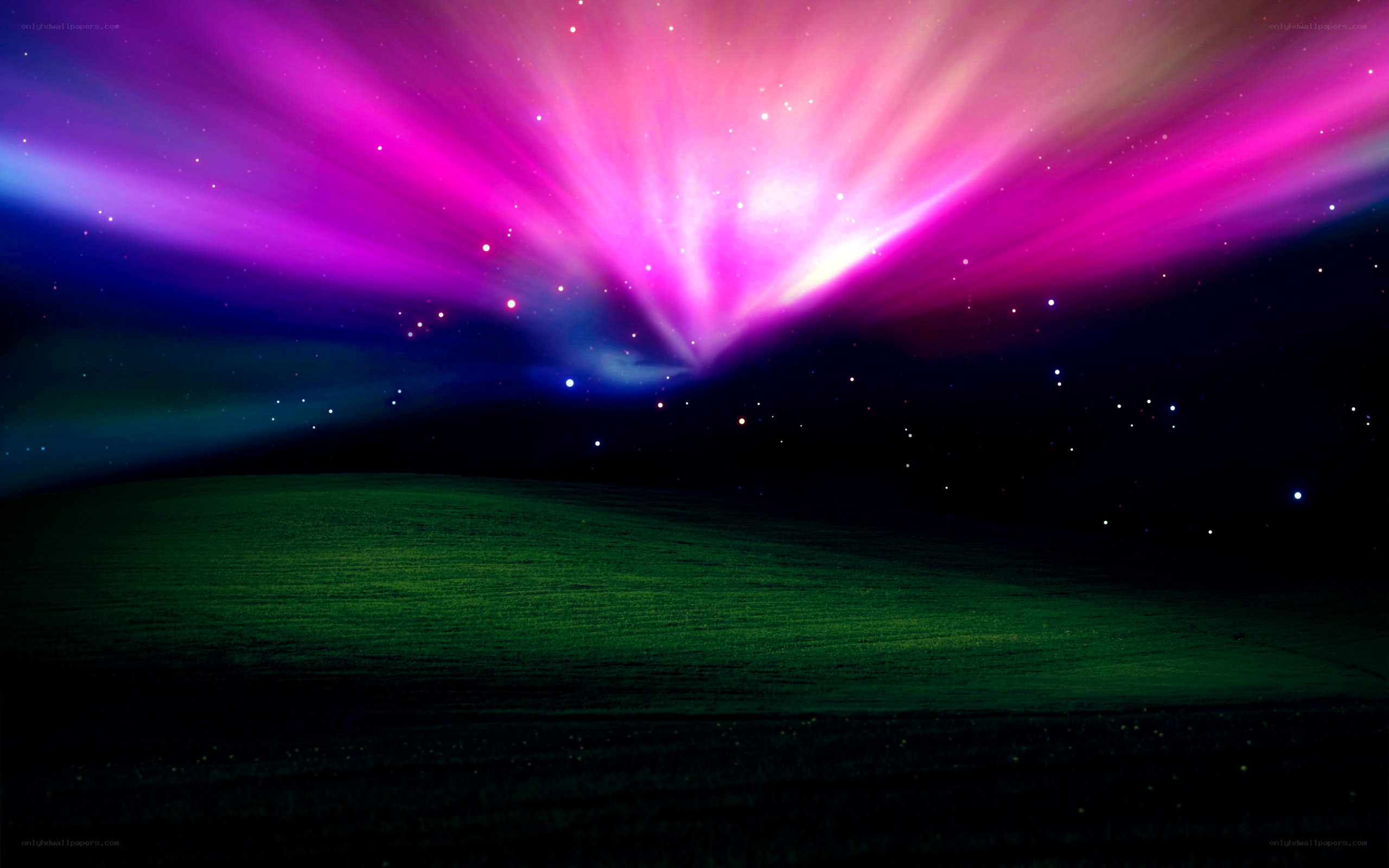 aurora over green field