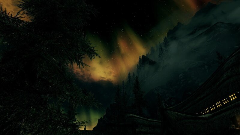 aurora over mountain village