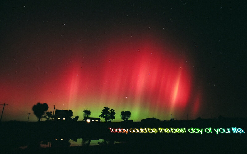 Aurora over rural landscape
