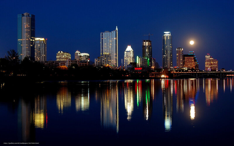 Austin skyline at night with moon