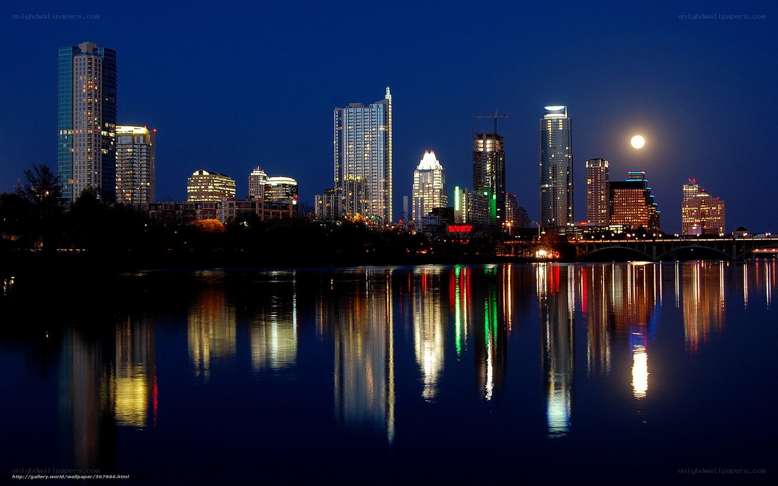 Austin skyline at night with moon