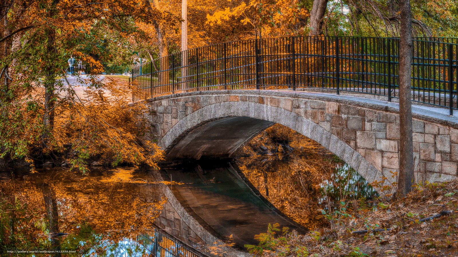 Autumn bridge over canal