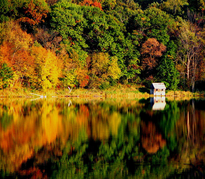 Autumn cabin by the lake