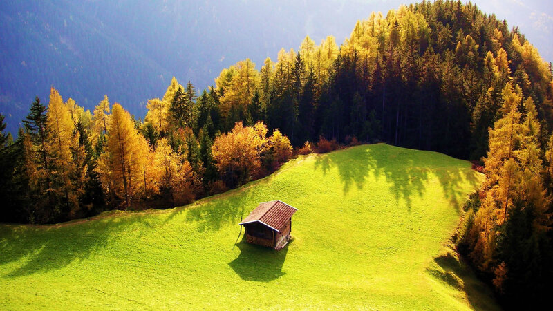 Autumn cabin in the mountains