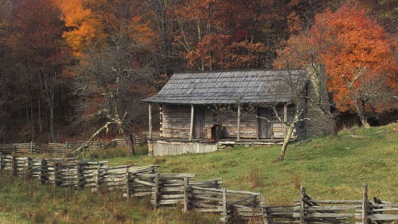 Autumn cabin in the mountains