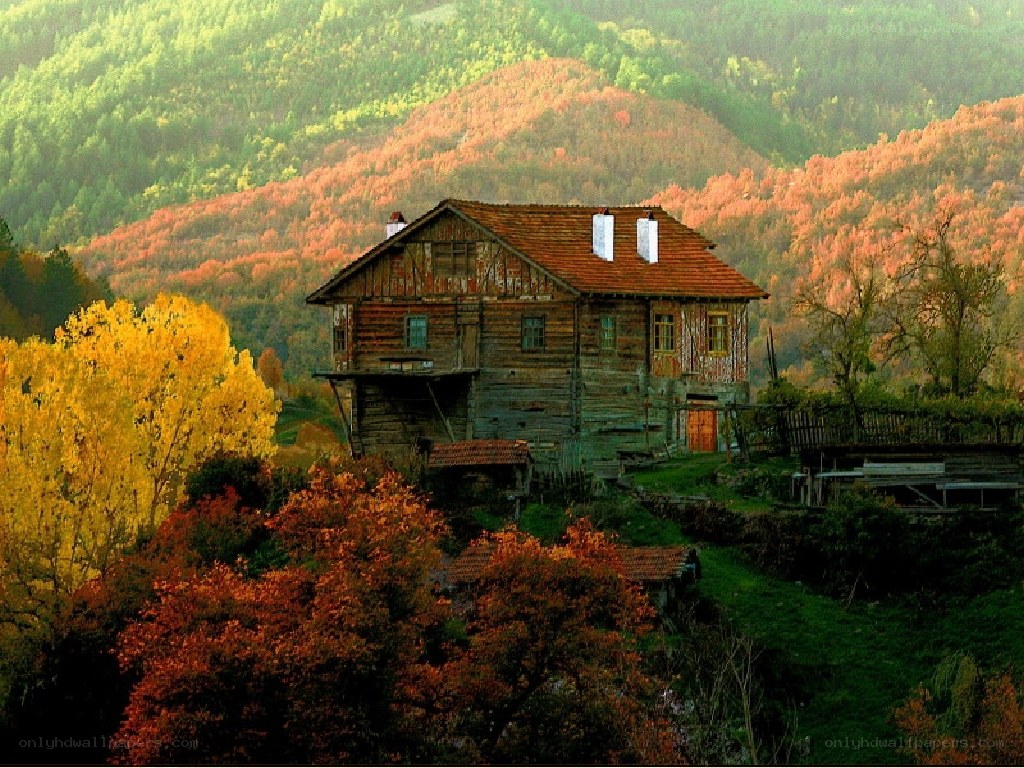 Autumn cabin in the mountains