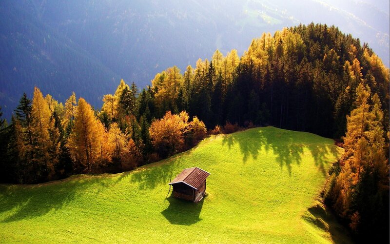Autumn cabin in the mountains