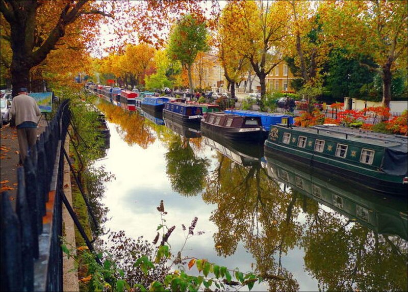 Autumn canal scene with boats