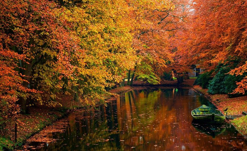Autumn canal with boat