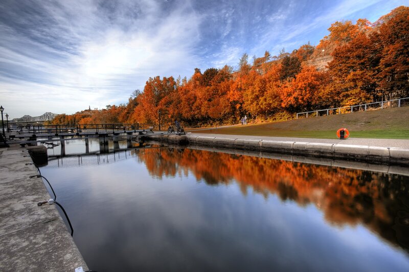 Autumn canal with colorful trees