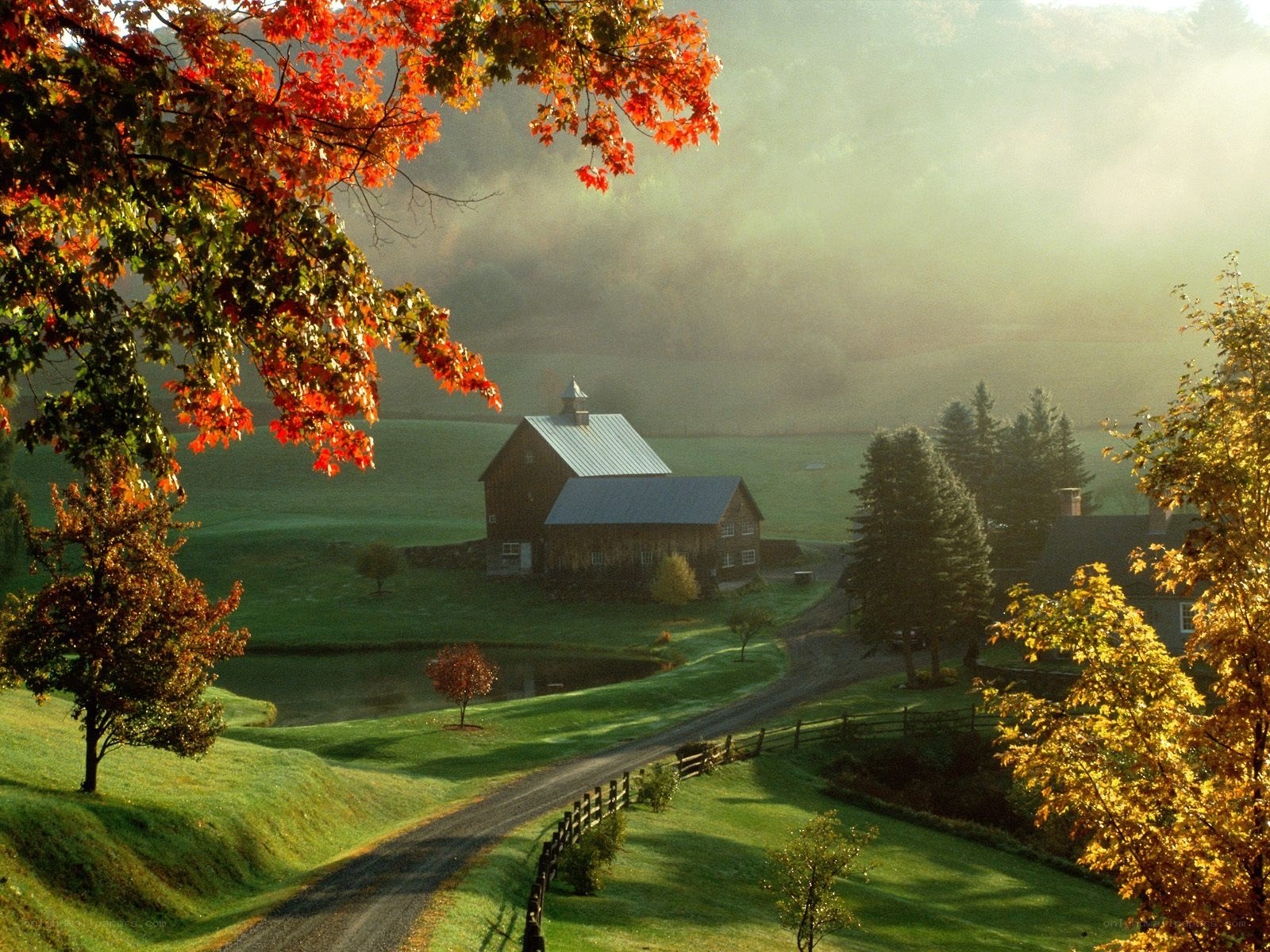 Autumn farm in the mist