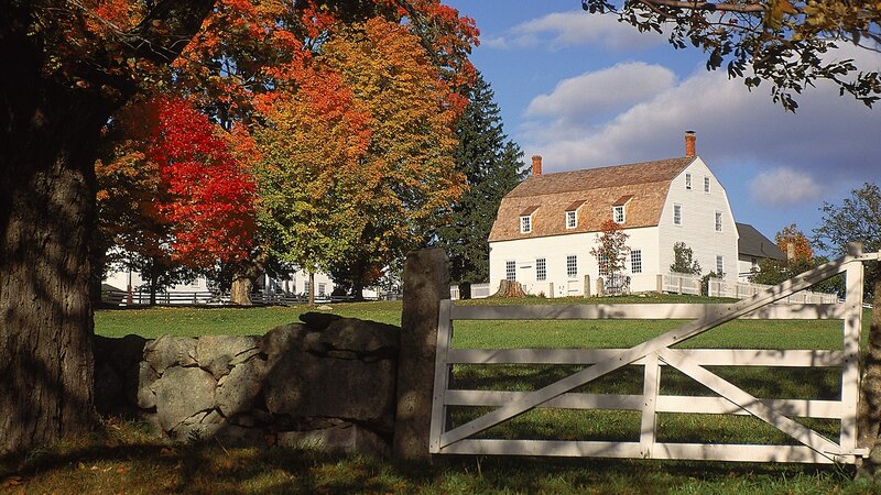 Autumn farm with white house