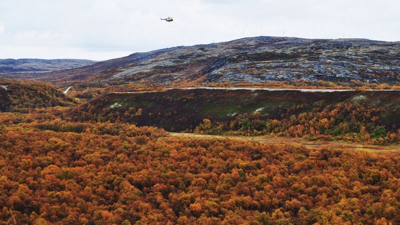 Autumn forest with helicopter