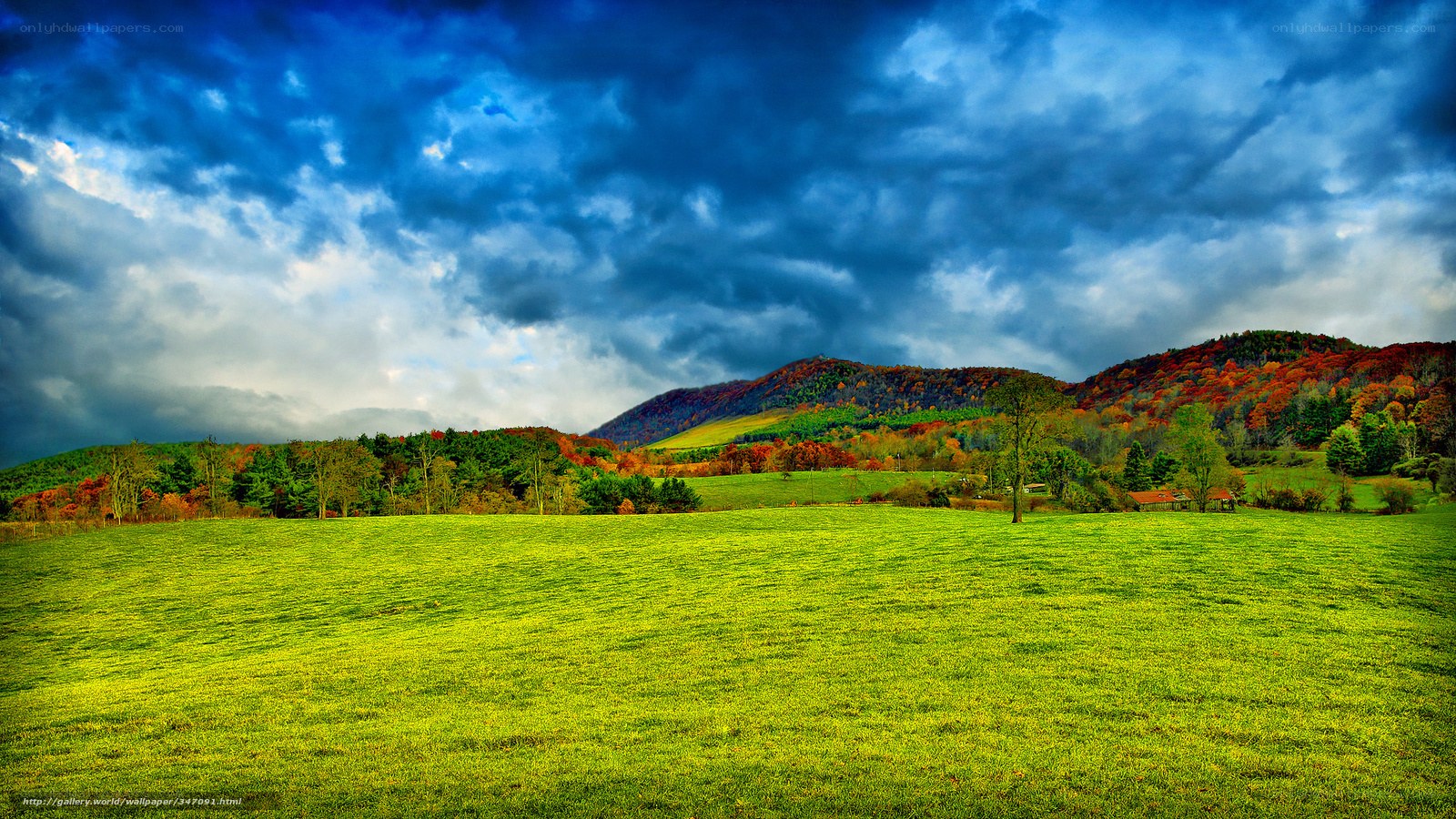 Autumn hills under stormy sky