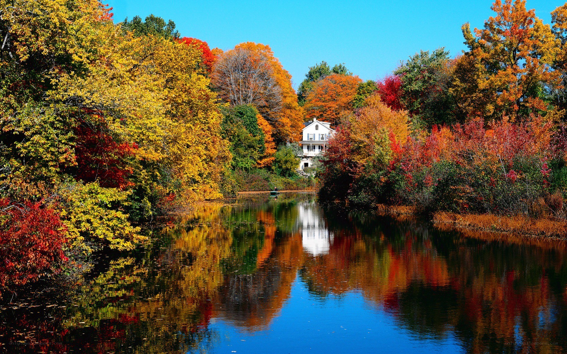 Autumn house by the river