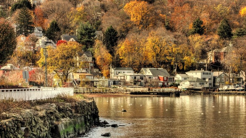 Autumn houses by the water