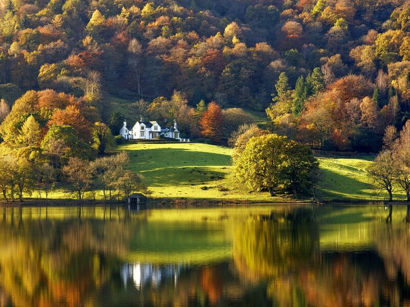 Autumn lake house reflection
