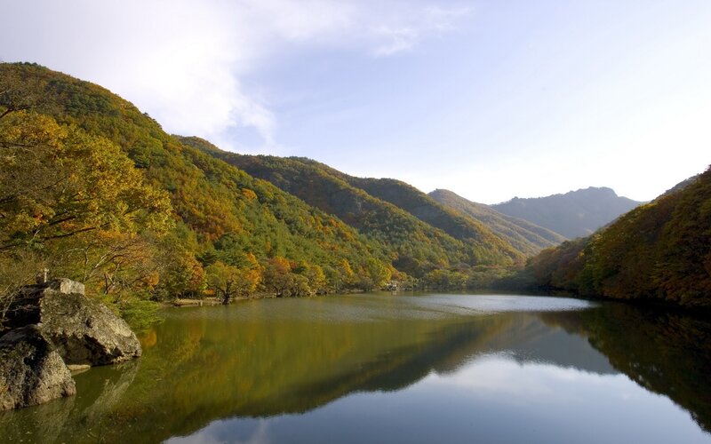 Autumn lake in mountain valley