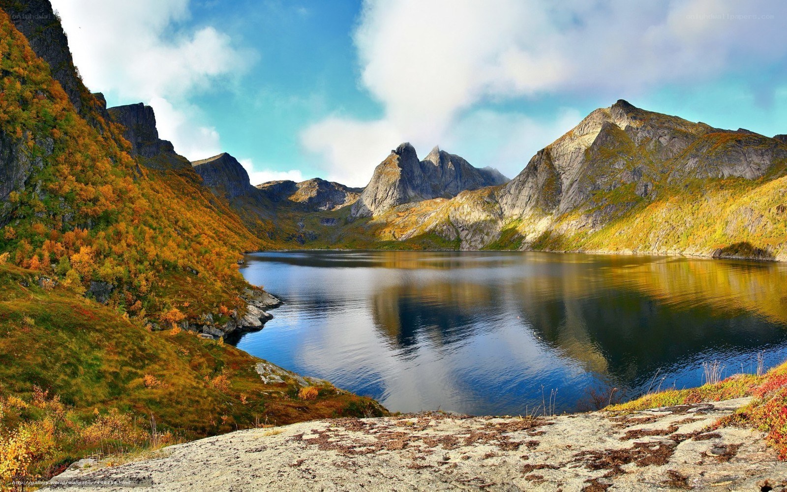 Autumn lake in mountain valley