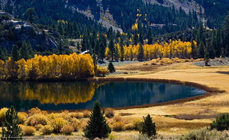 Autumn lake in mountain valley