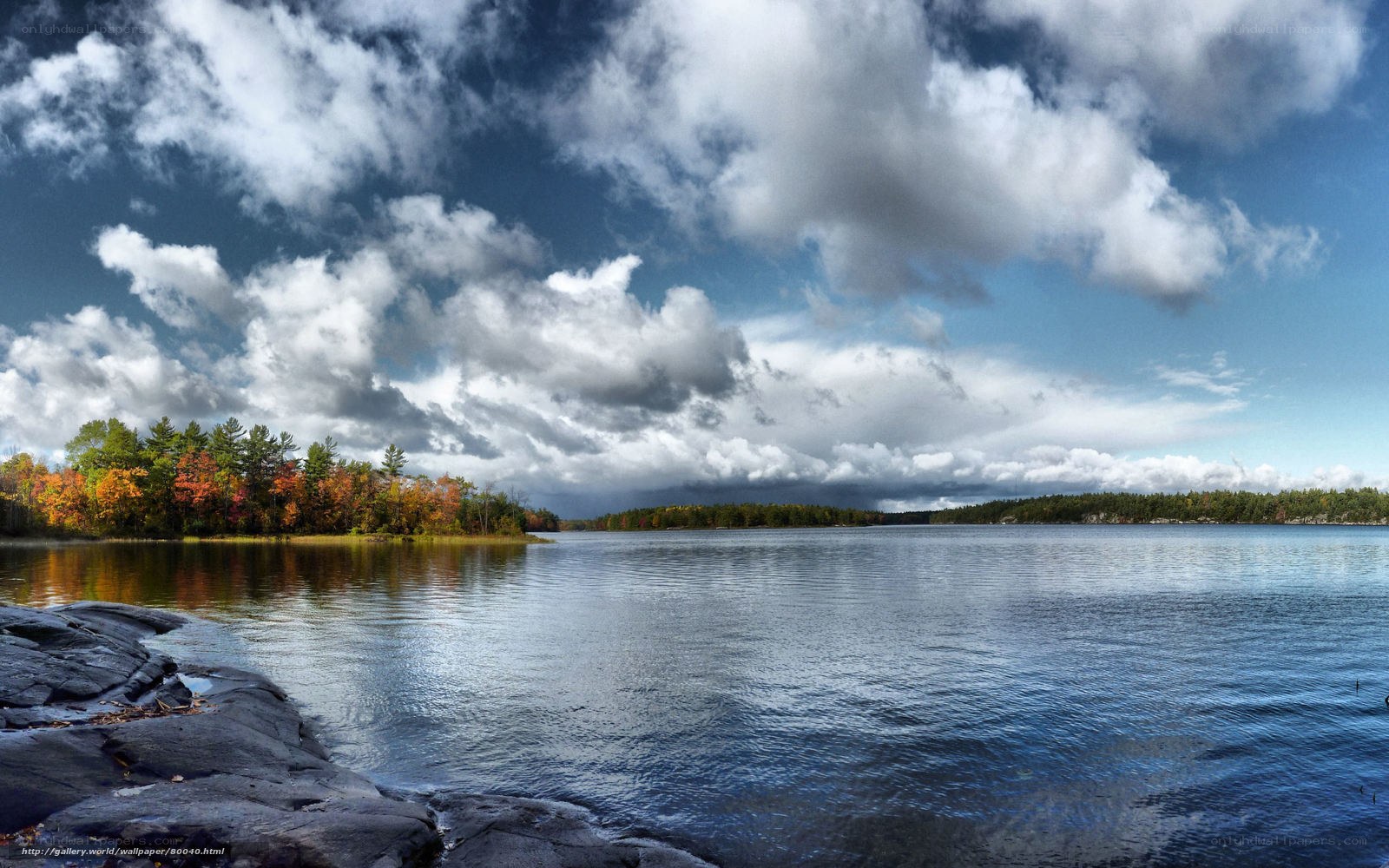 Autumn lake with cloudy sky