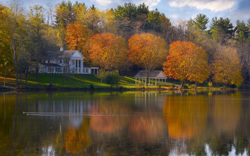 Autumn lake with house and trees