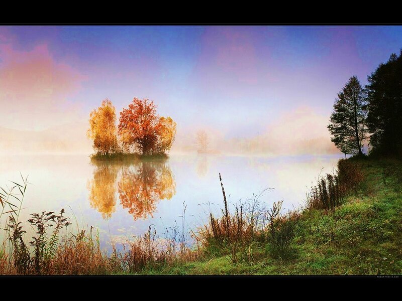 Autumn lake with misty island