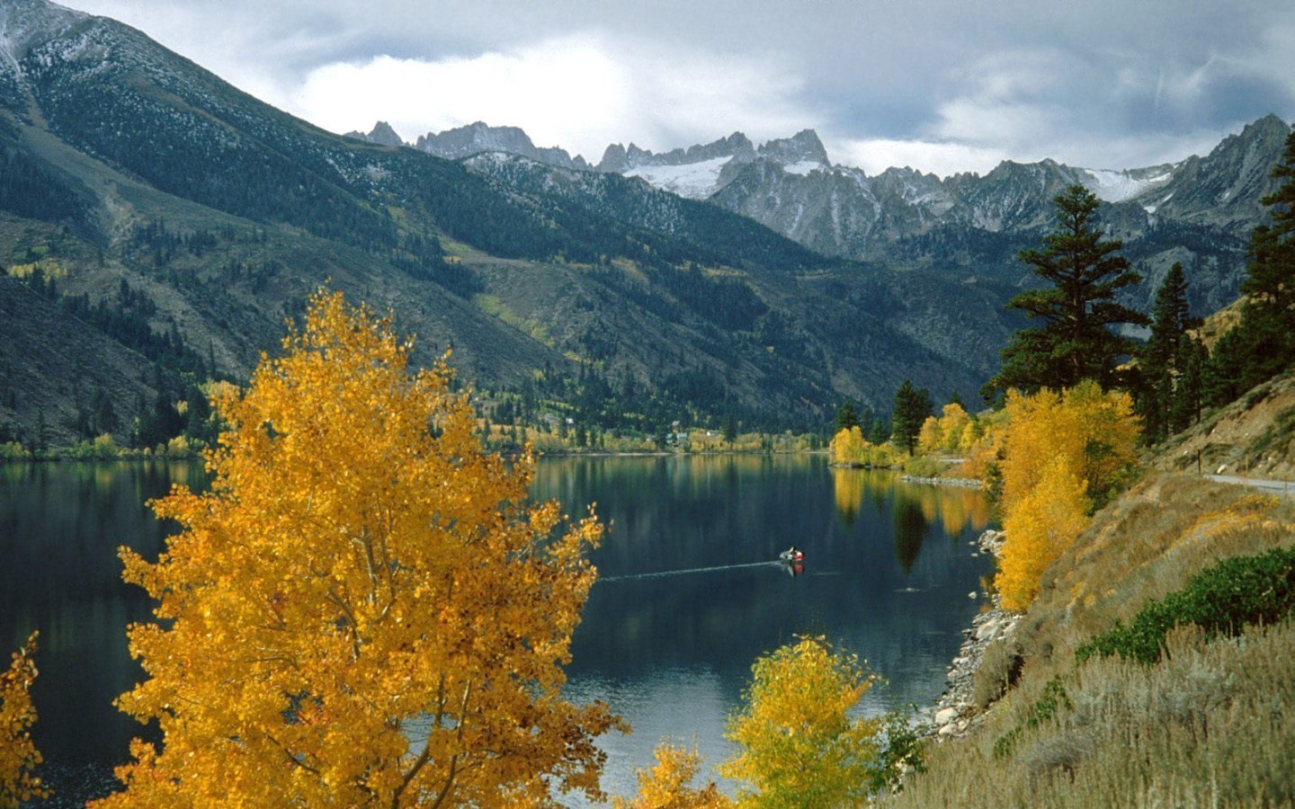 Autumn lake with mountain backdrop
