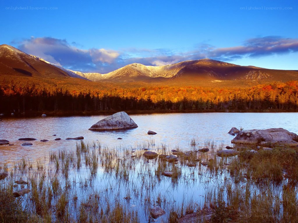 Autumn lake with mountain backdrop
