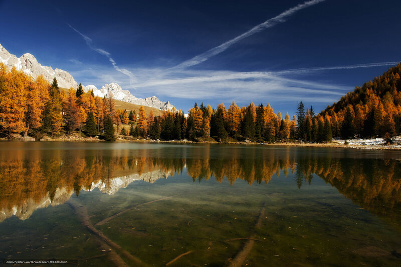 Autumn lake with mountain reflection