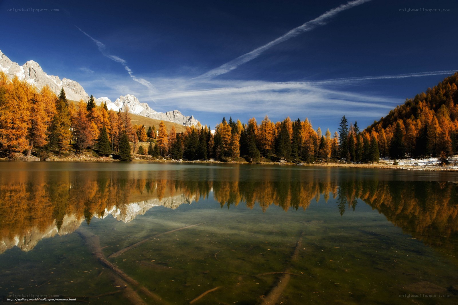 Autumn lake with mountain reflection