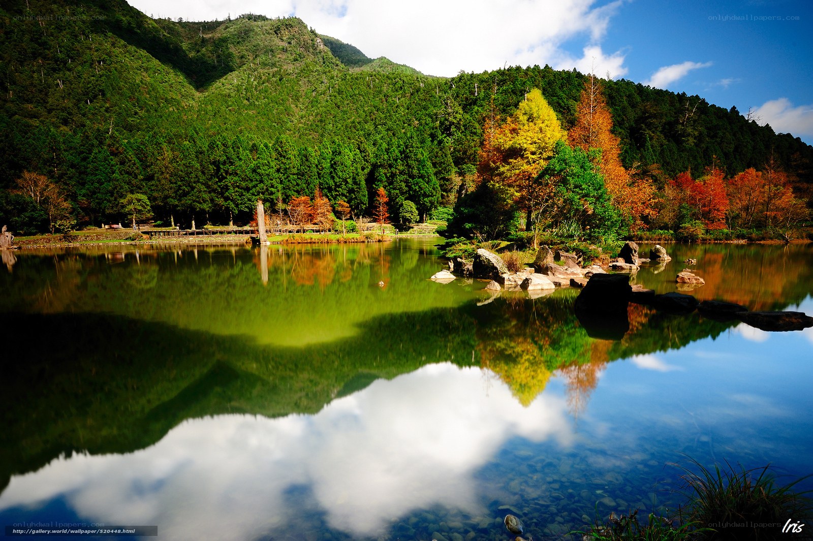 Autumn lake with mountain reflection