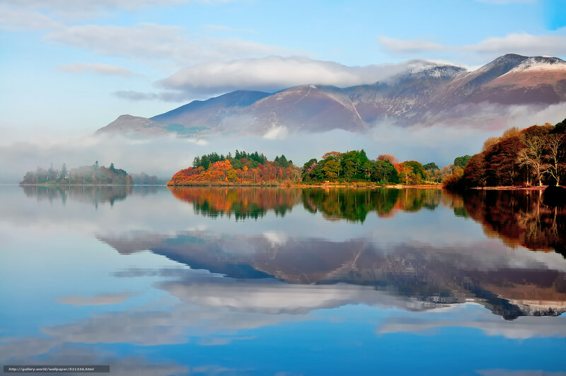 Autumn lake with mountain reflection