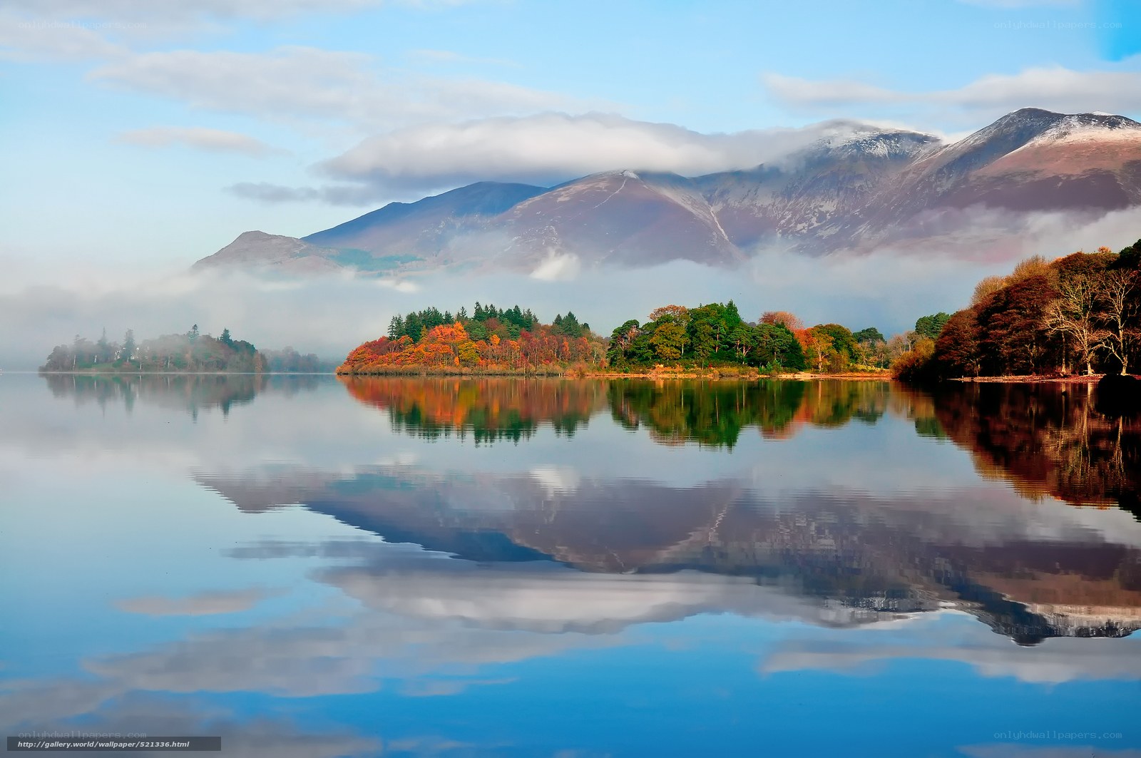 Autumn lake with mountain reflection