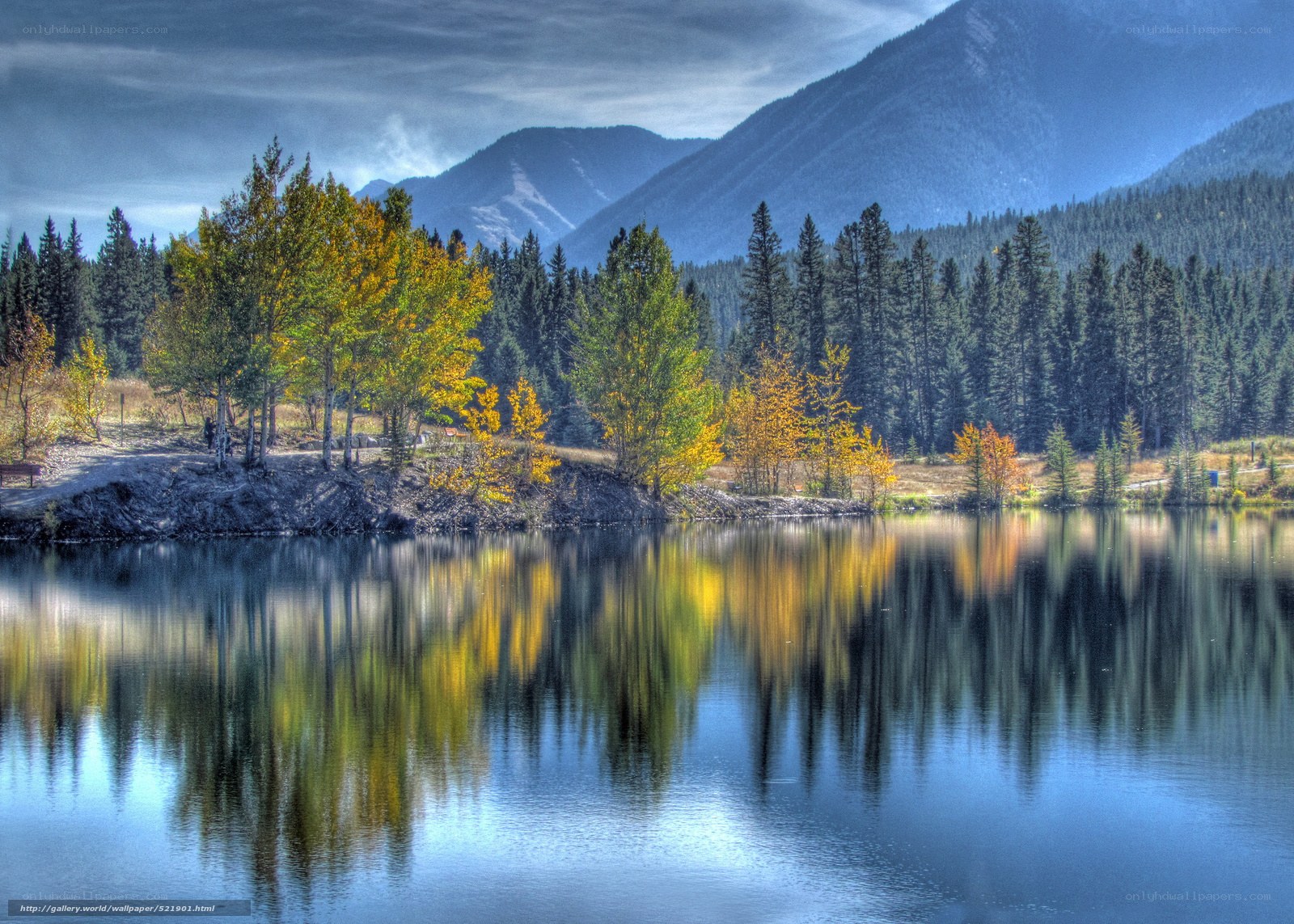 Autumn lake with mountain reflection