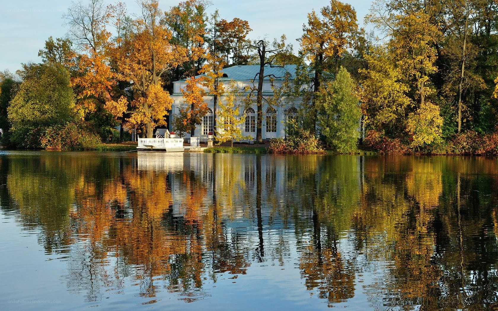 Autumn lake with pavilion