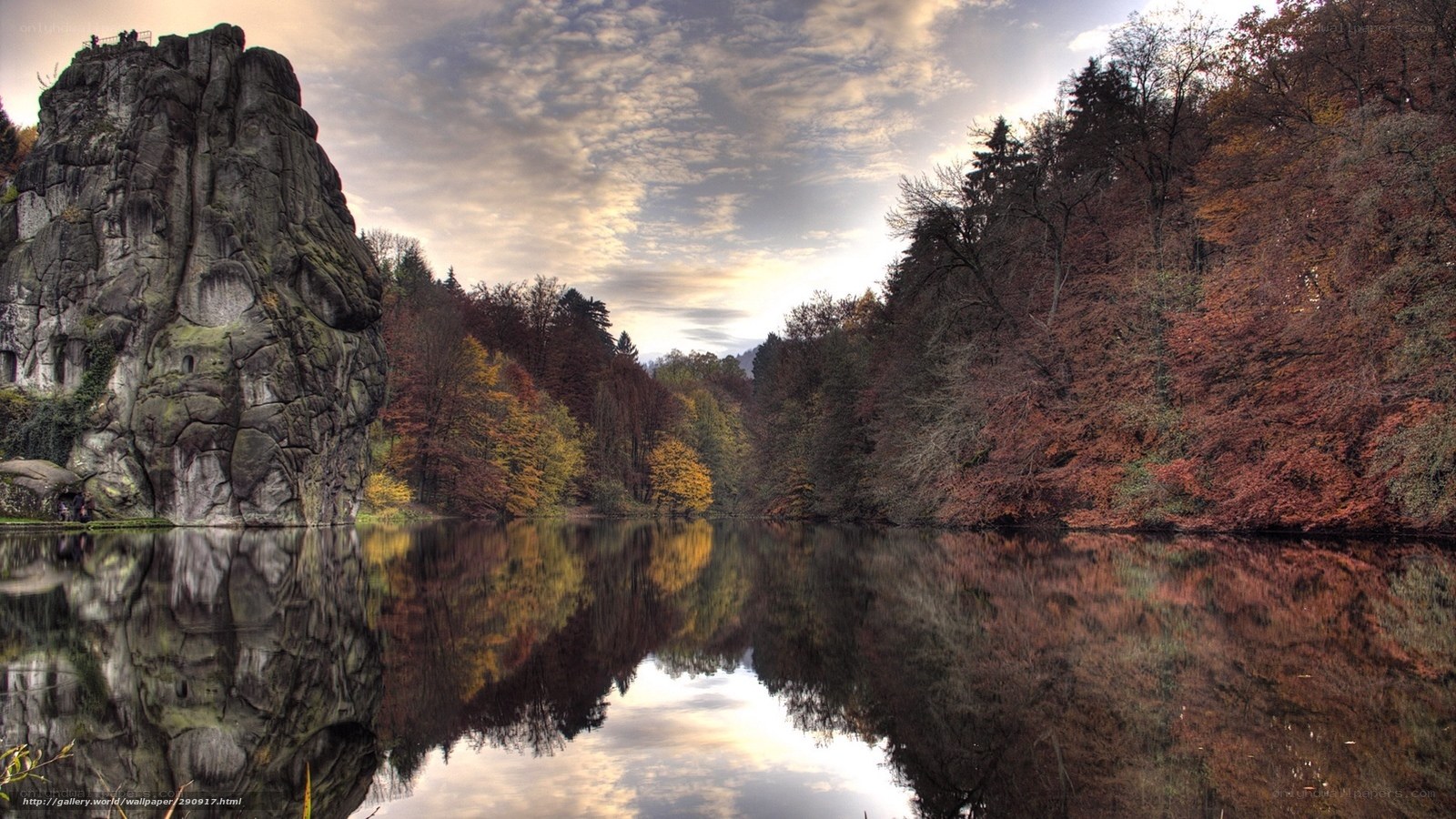 Autumn lake with rock formation