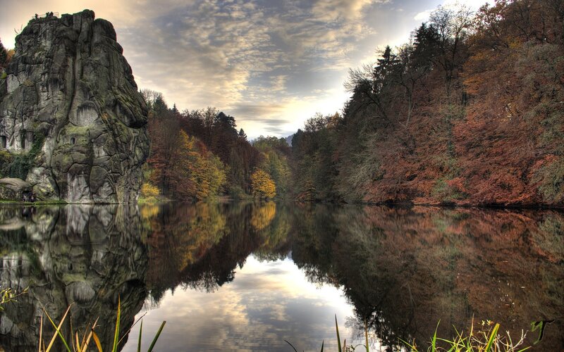 Autumn lake with rock formation