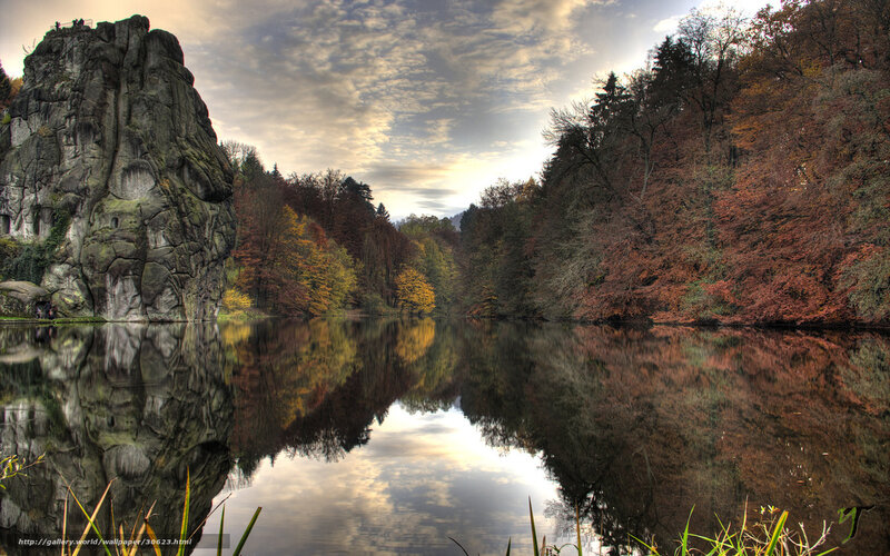 Autumn lake with rock formation