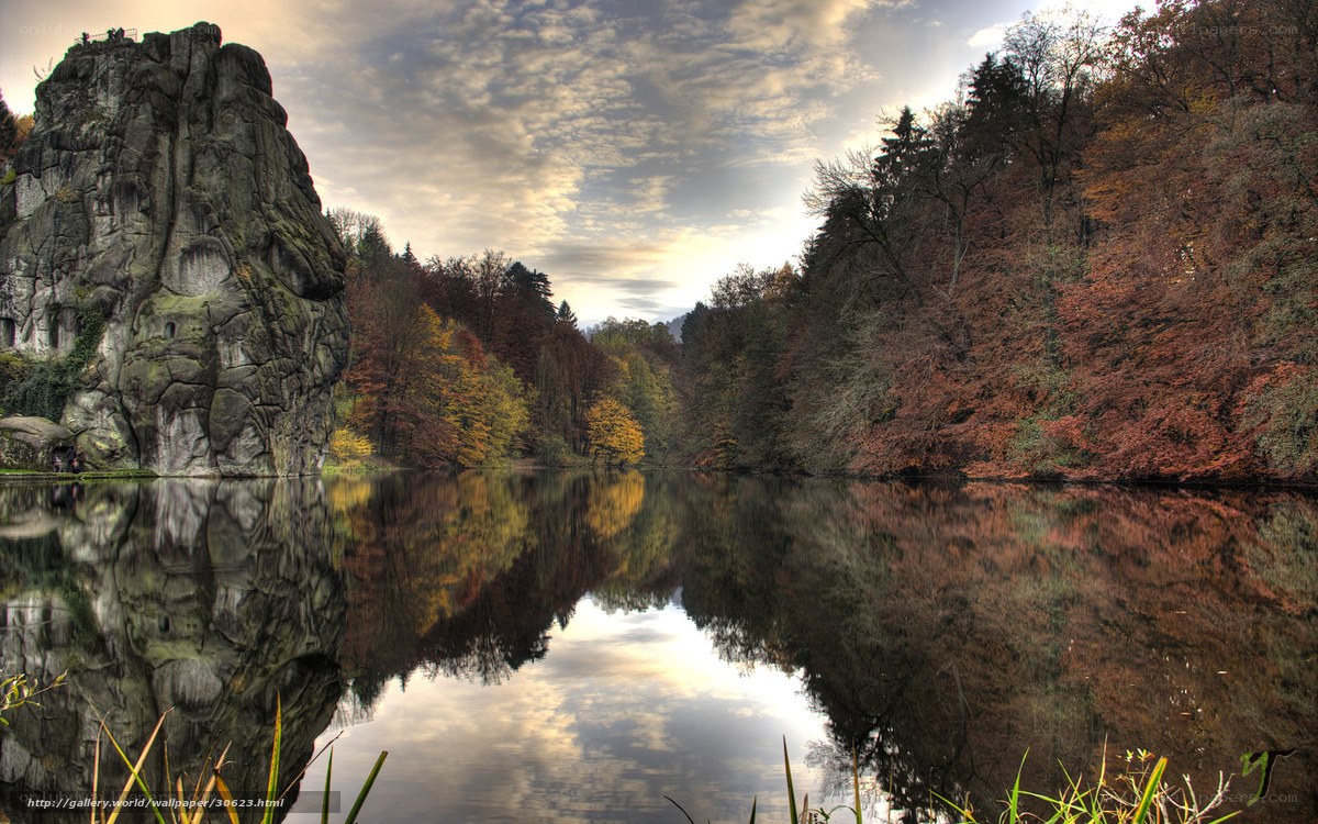 Autumn lake with rock formation