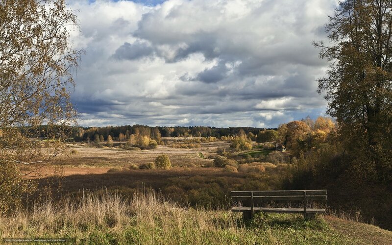 Autumn landscape with bench