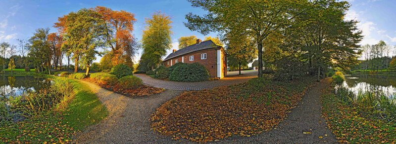 Autumn landscape with house and pond